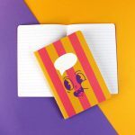 Ava&Yves - Notizheft Stripes Funny Face pink/gelb/lila